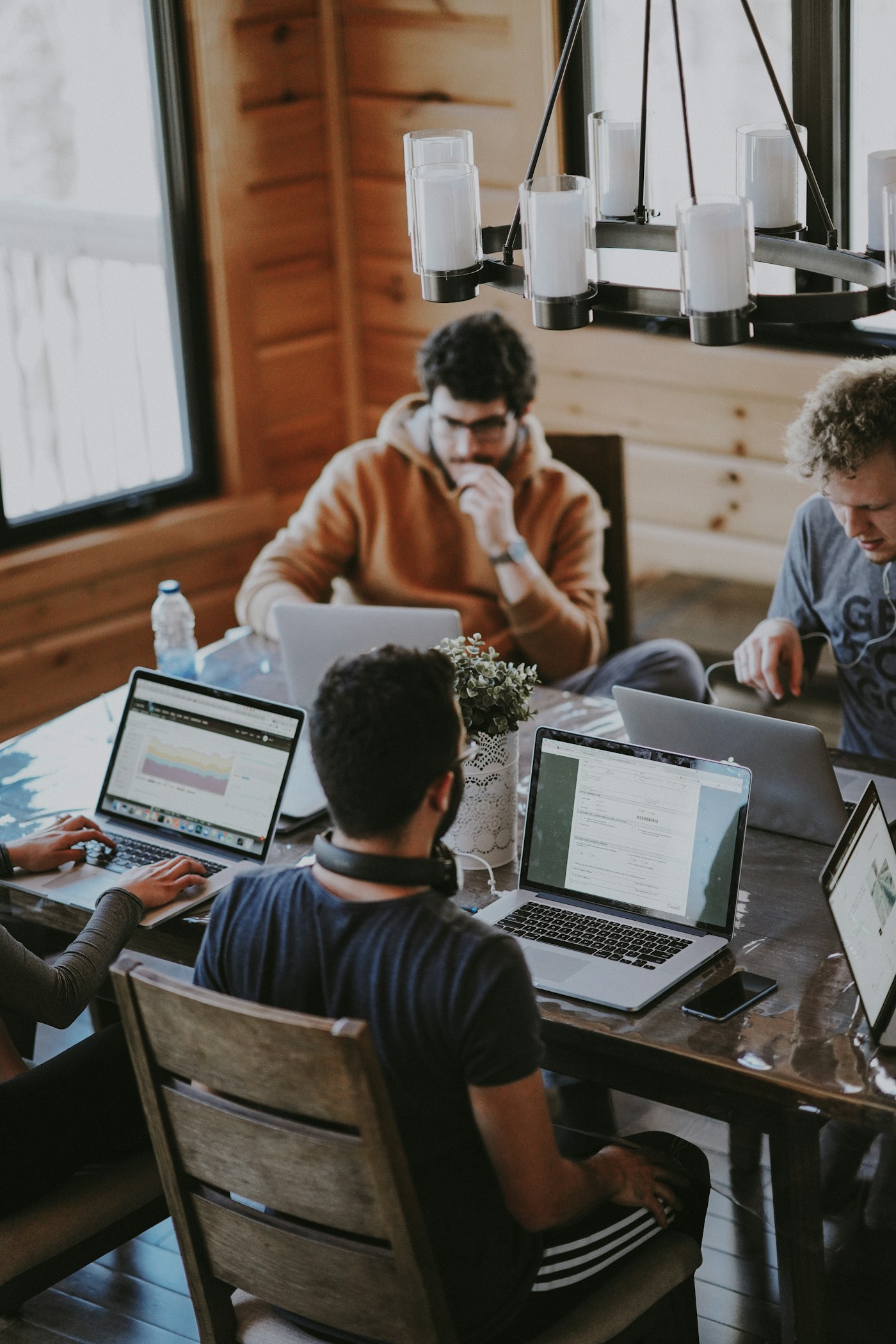People collaborating around a table in a studio office